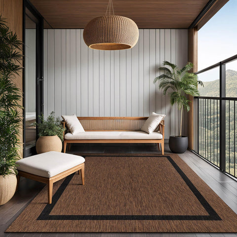 Luul Home bordered outdoor rug 8x10 waterproof weave protects against moisture and wear.