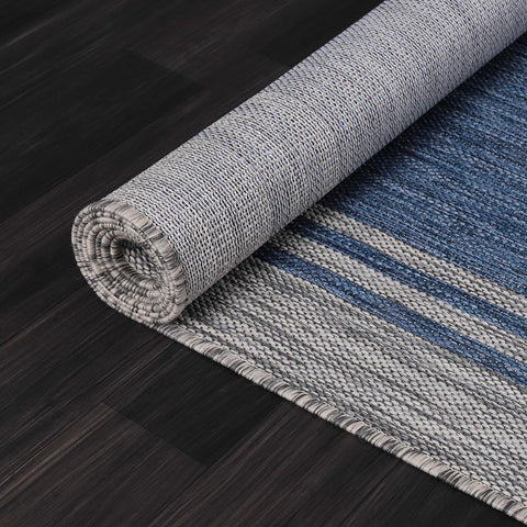 Luul Home navy bordered rug enhancing living room or porch design