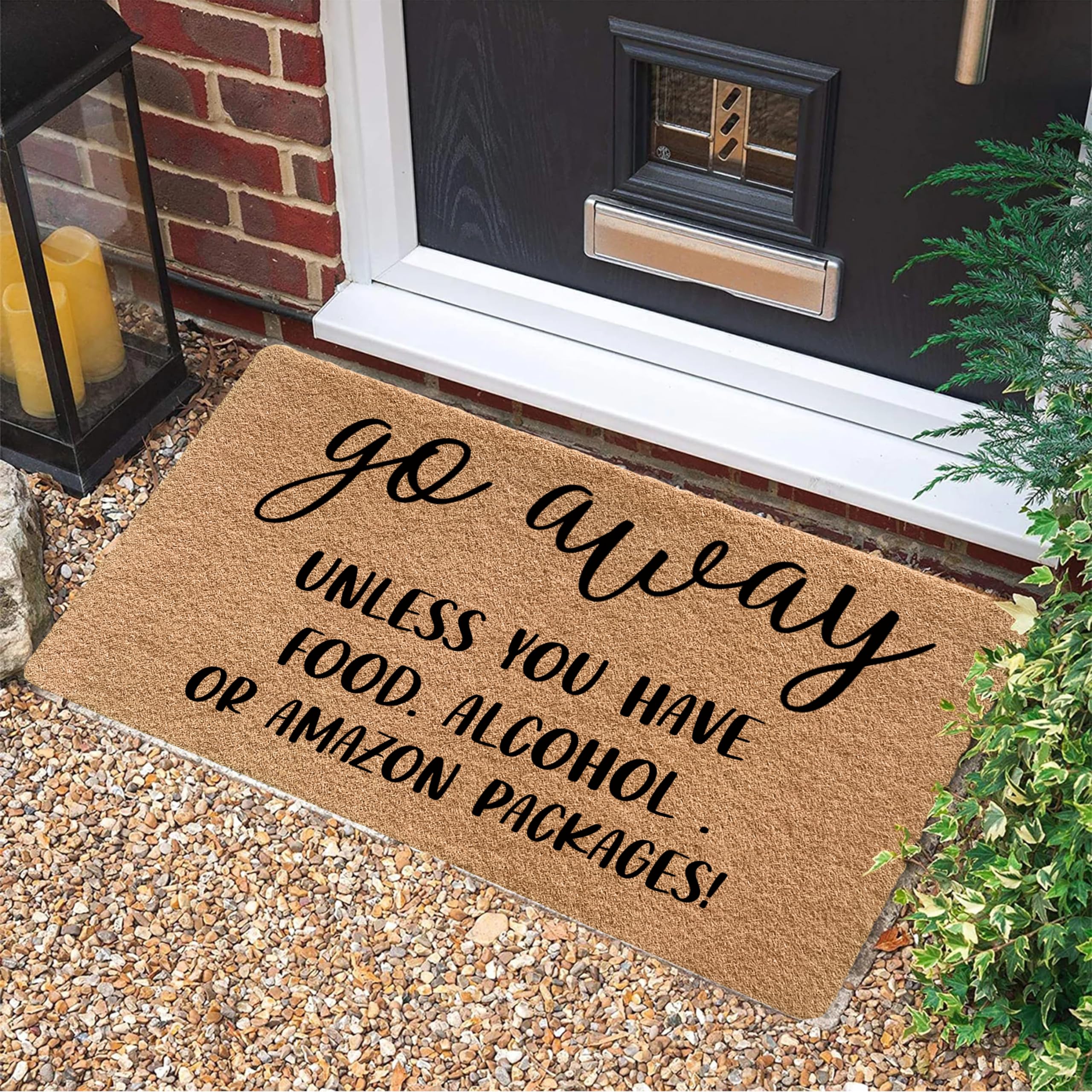 LUVADIAN Go Away mat on front door boosts curb appeal with humor.