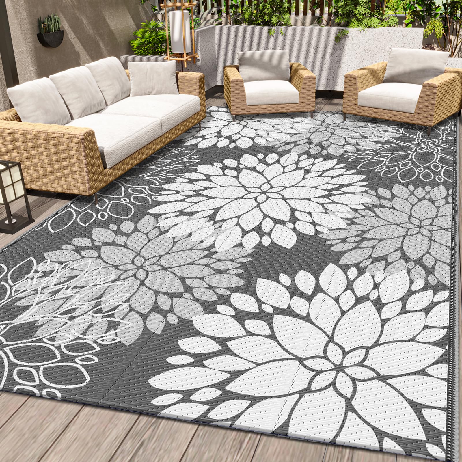 LuxStep outdoor rug grey 5x8 laid on patio for a weather-ready entertaining space