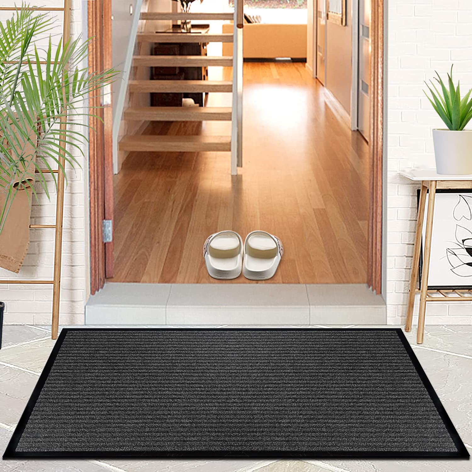 LuxUrux beveled border dirt mat blocks moisture and mud at the doorway