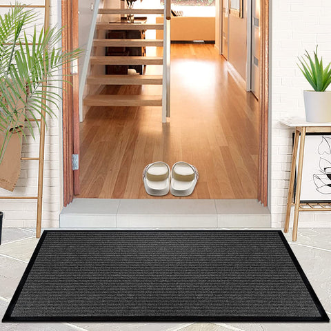 LuxUrux beveled border dirt mat blocks moisture and mud at the doorway