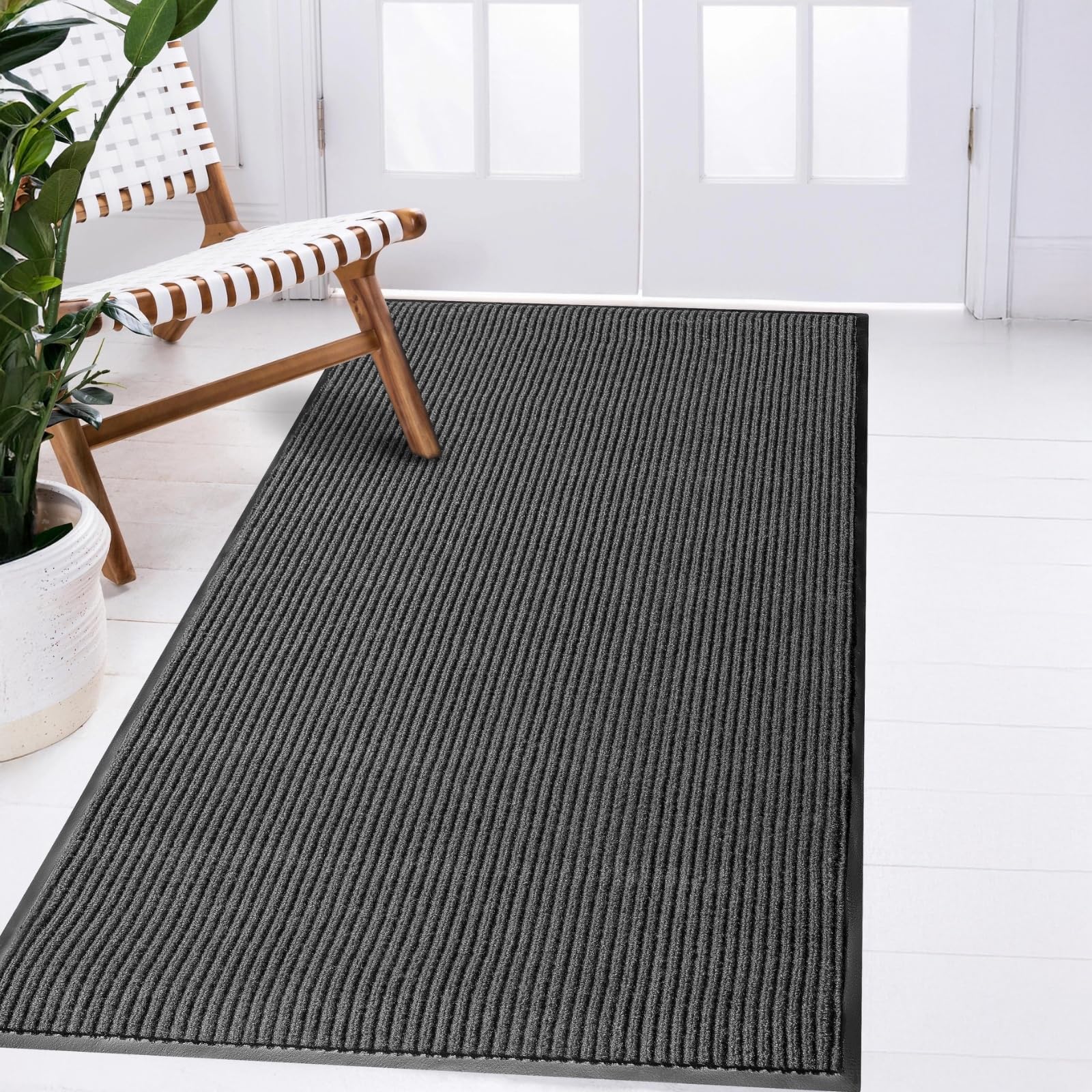 LuxUrux durable rubber entry mat traps dirt and withstands heavy traffic