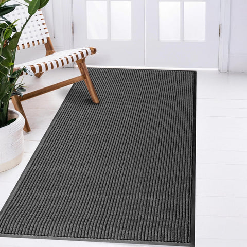 LuxUrux durable rubber entry mat traps dirt and withstands heavy traffic