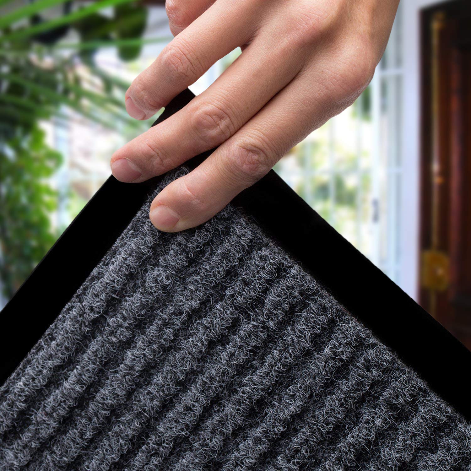LuxUrux slip-resistant backing mat prevents shifting in busy doorways