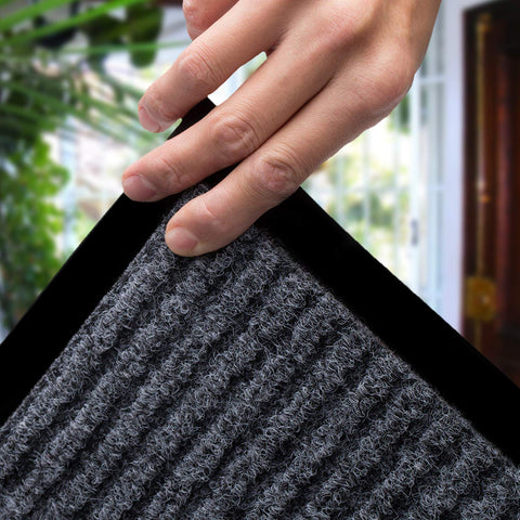 LuxUrux slip-resistant backing mat prevents shifting in busy doorways
