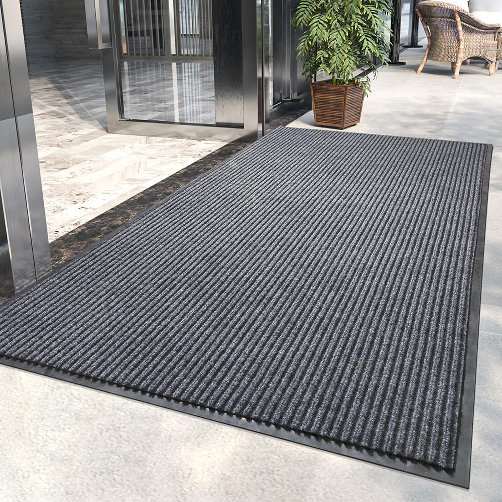 LVETOLS Moisture Guard Doormat at the front door with stripe pattern and durable protection.