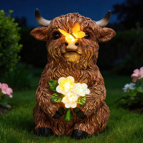 LXOUMEI solar Highland cow statue with nose butterfly glow for garden charm.
