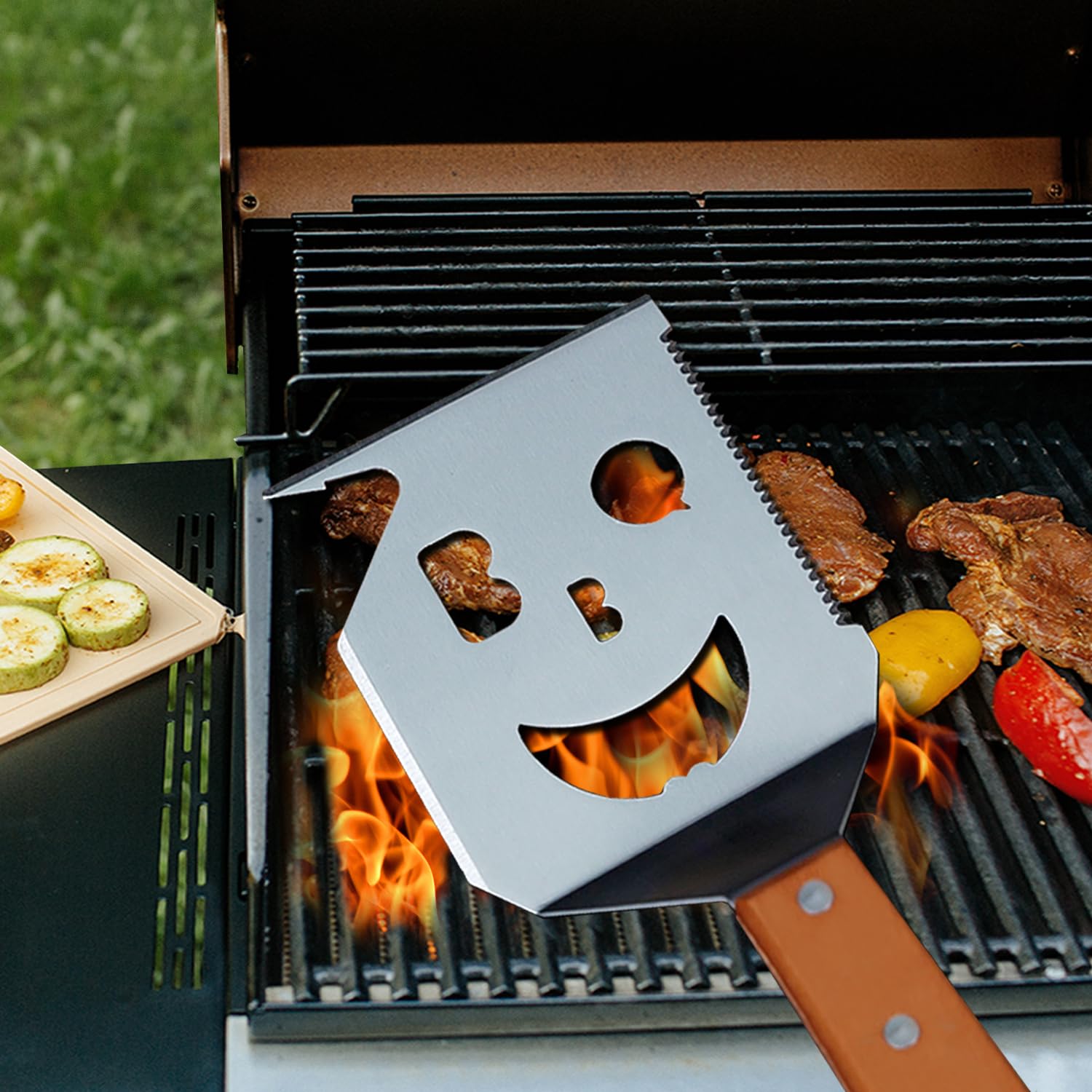 M-HHonger BBQ spatula with smiling-face design enhances backyard grilling experience.