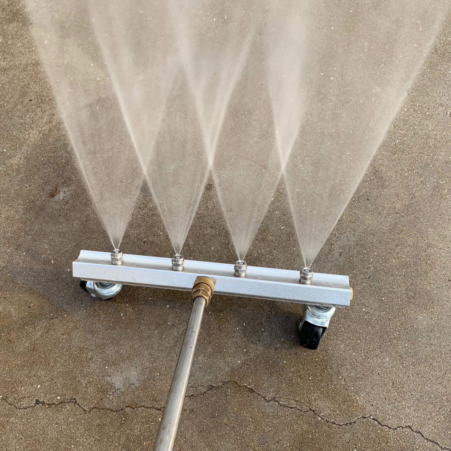 M MINGLE in-action under a vehicle, targeting road grime and oil