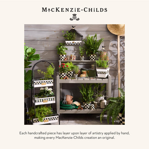 MacKenzie-Childs home decor with herb pots complementing other accents