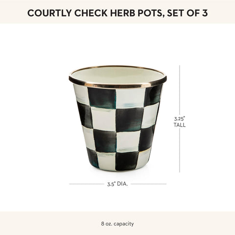 MacKenzie-Childs small planters arranged as a tabletop centerpiece