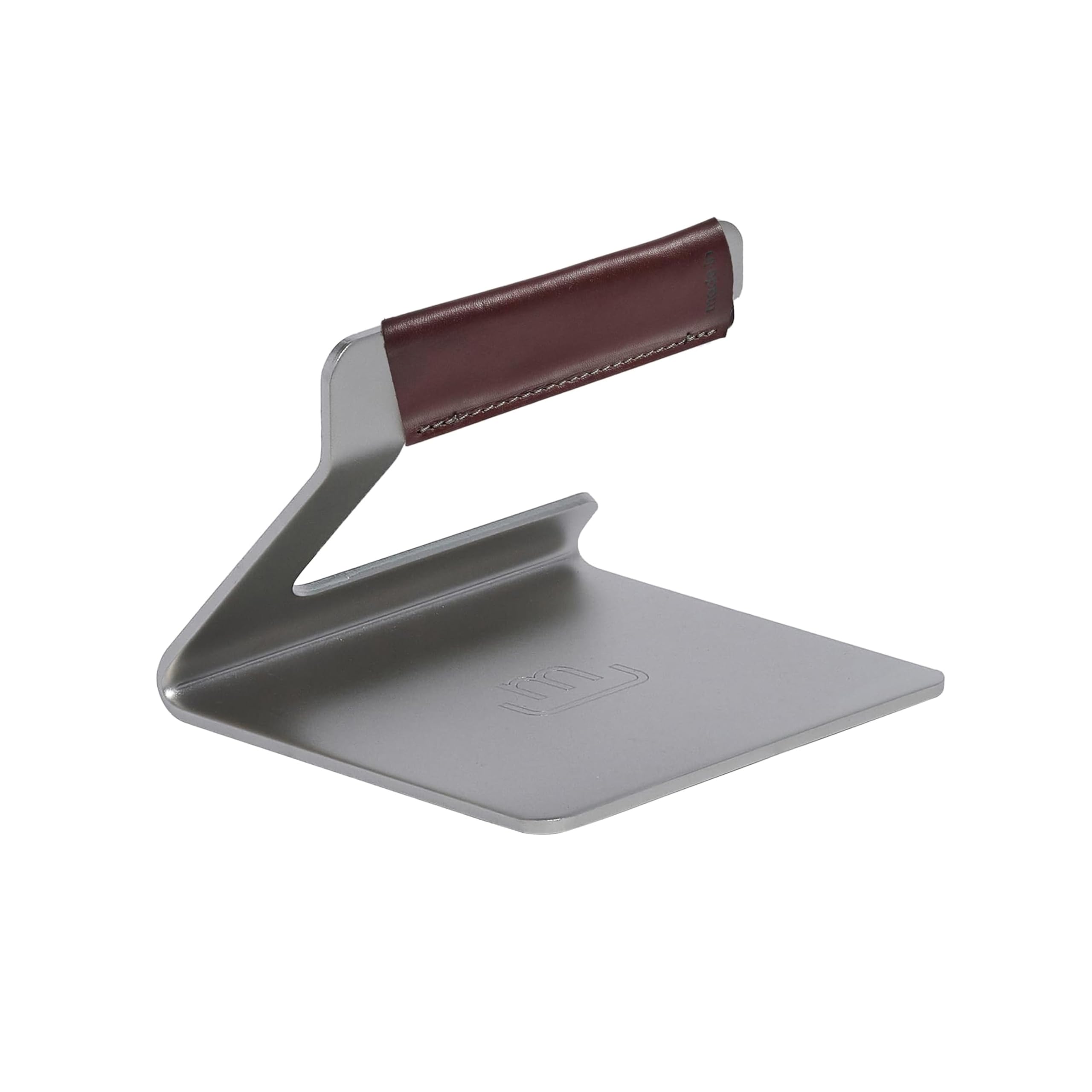 Made In grill press in stainless steel for even searing and crispy edges
