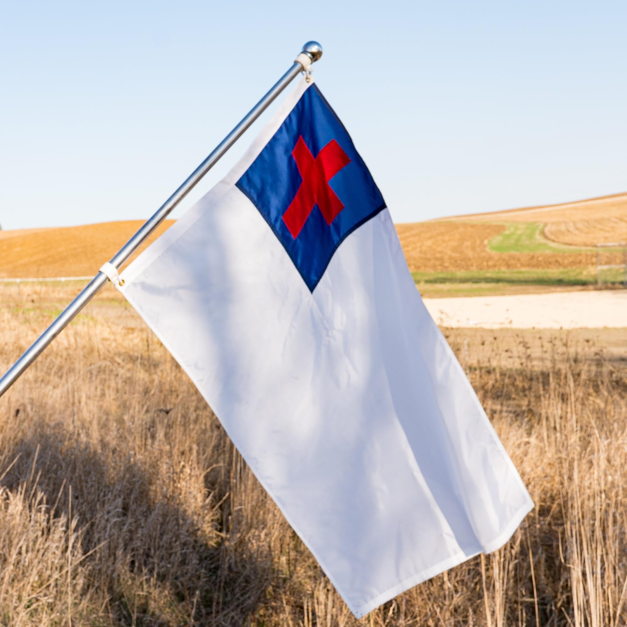 Made in USA Flags 3x5 Christian Flag durable header and reinforced seams prevent wear.