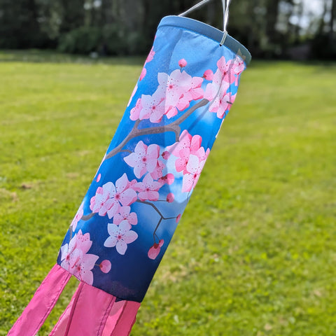 Durable polyester windsock with metal swivel clasp designed for year-round outdoor use