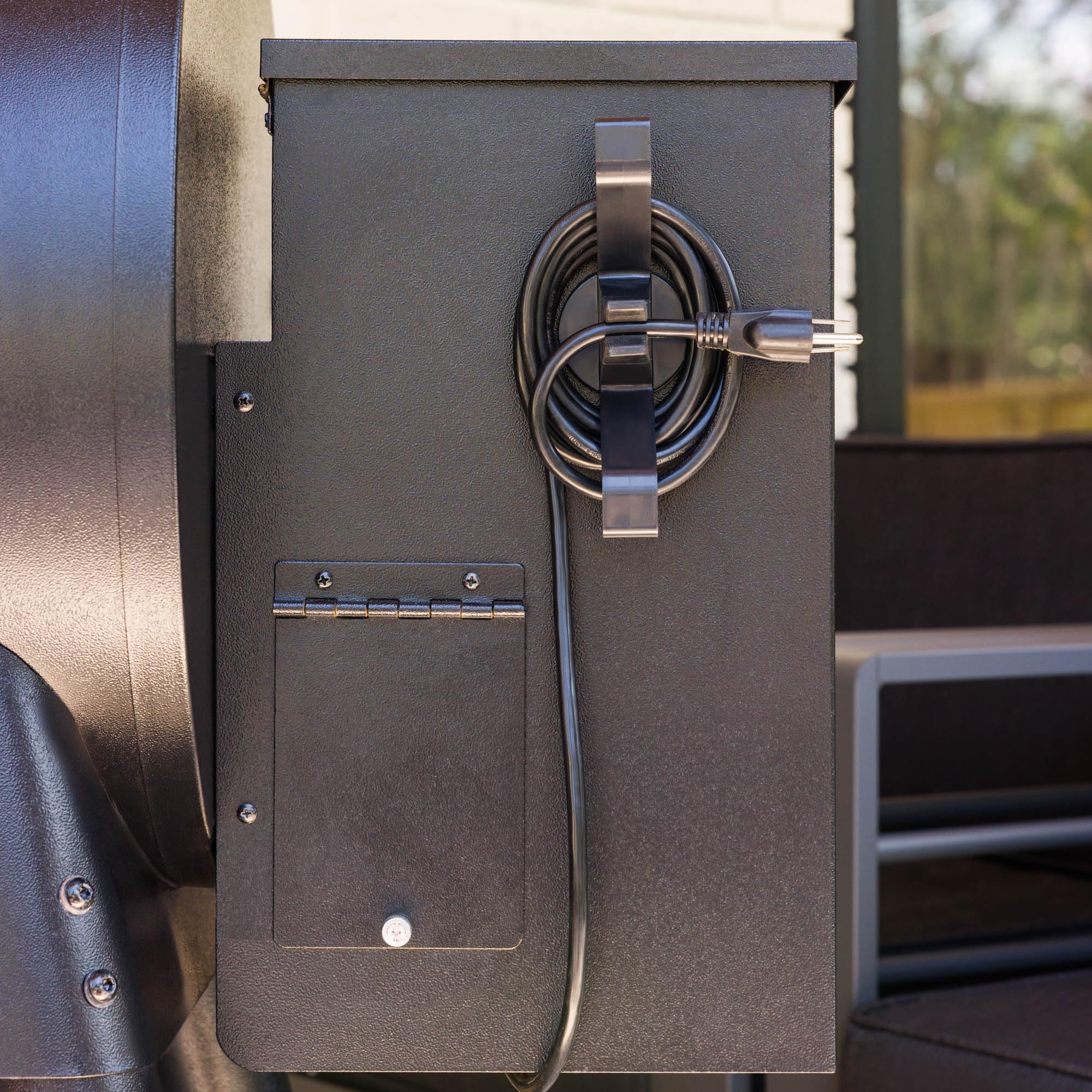 Magna Outdoors easy-install magnetic cord organizer shown on grill surface