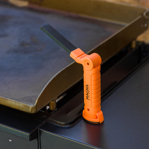 Magna Outdoors griddle night light with rotating arm directing light to the cooking zone.