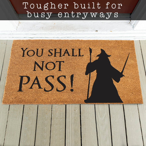 Covered outdoor MAINEVENT mat protects porch while staying stylish