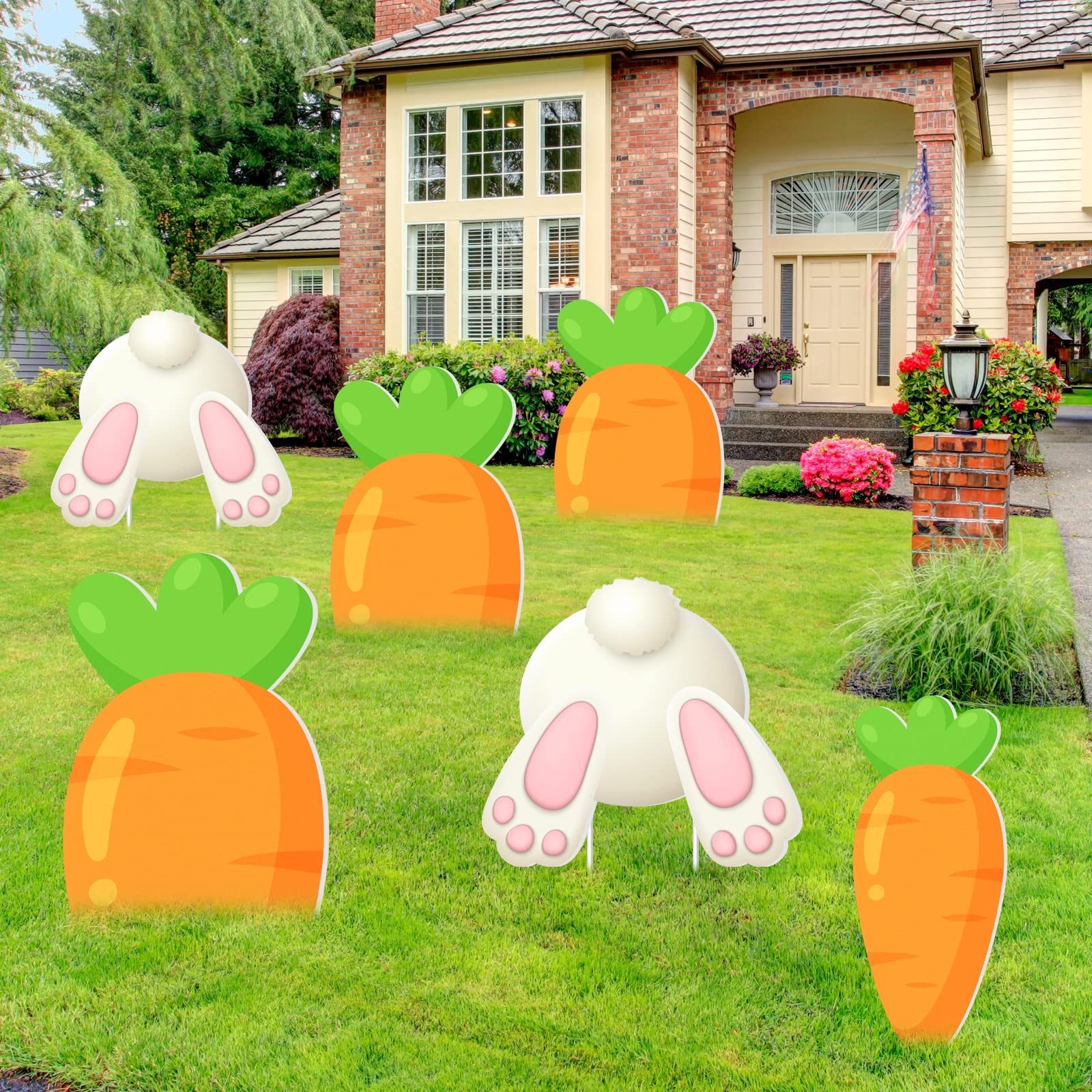 Maitys Easter yard stakes used as photo props for festive moments.