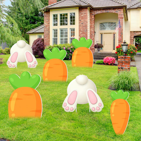 Maitys Easter yard stakes used as photo props for festive moments.