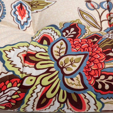 Makimoo cushion with ties secures to chairs.