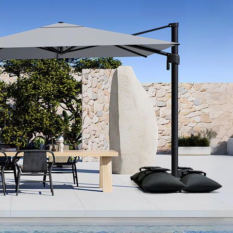Malomke umbrella base stability with sand bags secured.