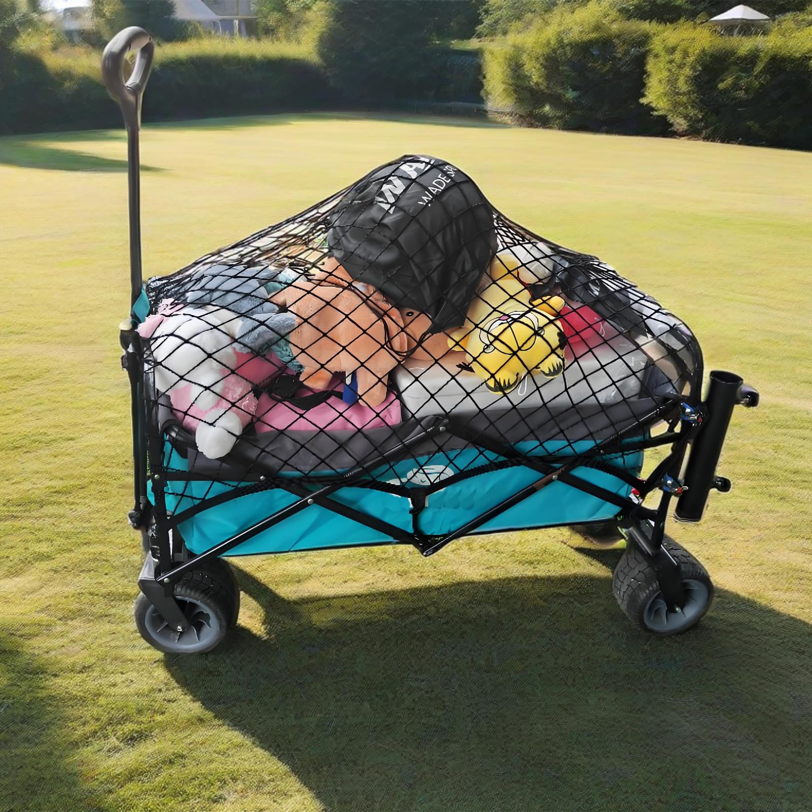Mamiko cargo net secures beach cart loads against shifting sand.