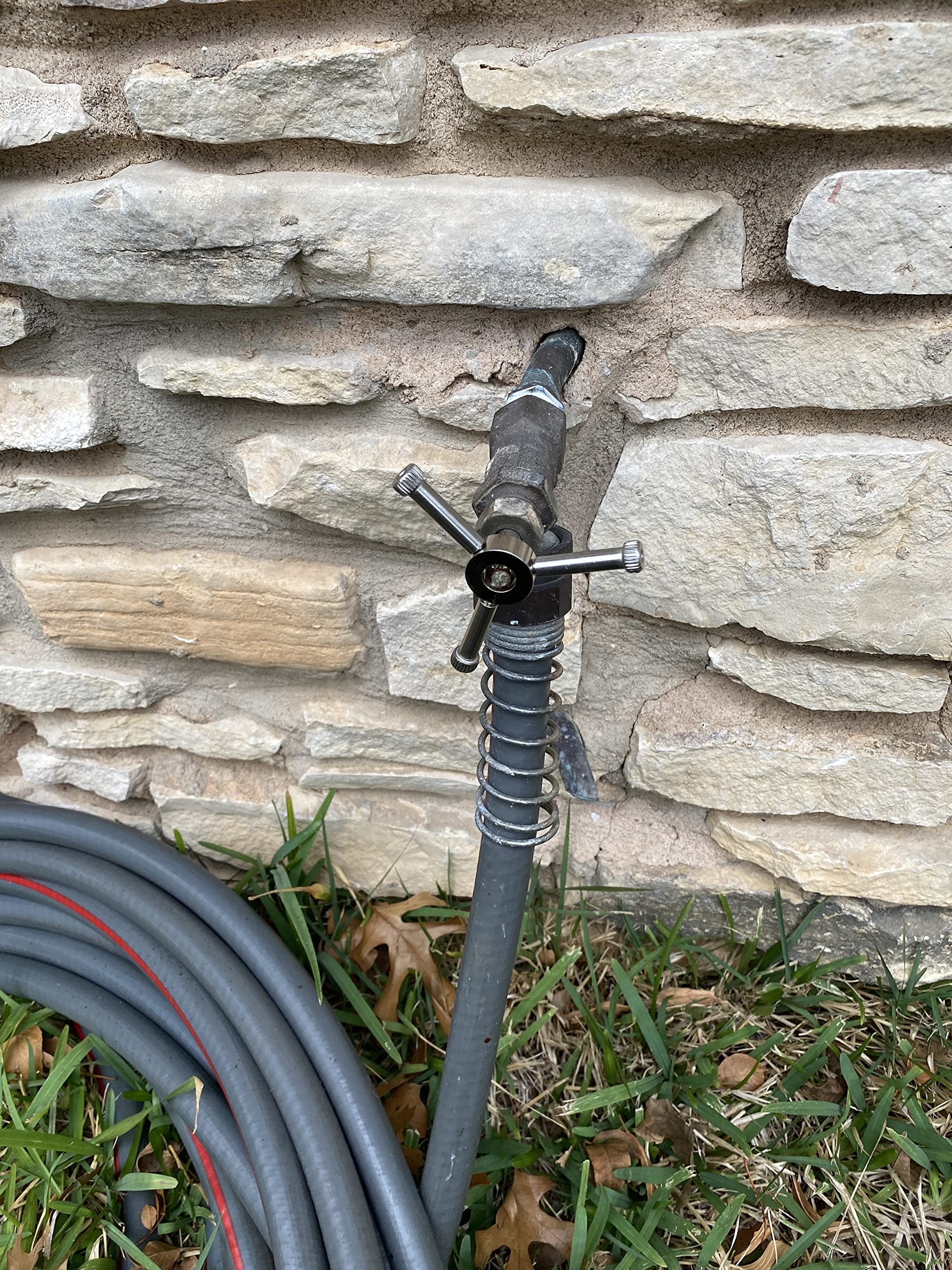 MANDLE spigot/outdoor faucet handle shown for reliable shut-off and control