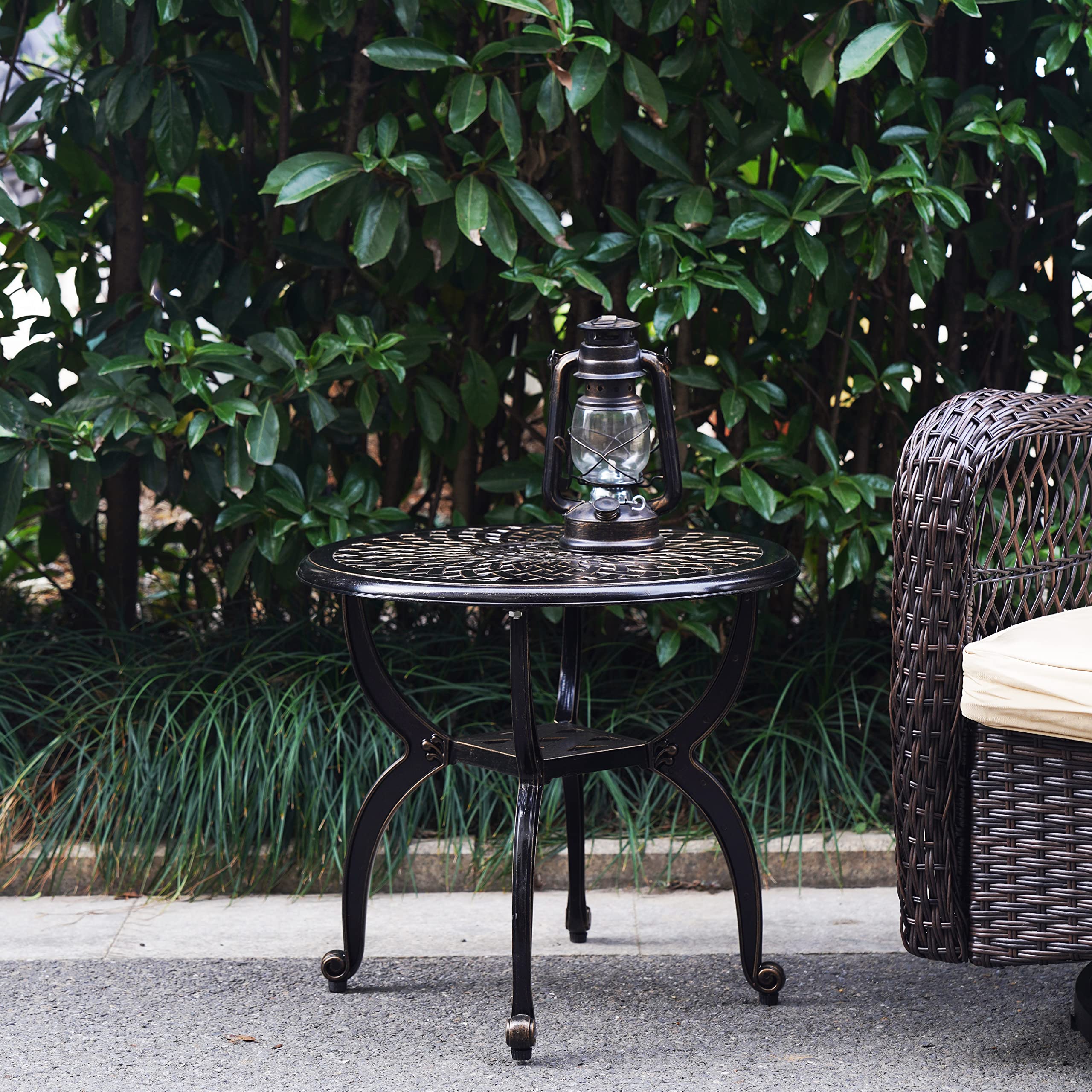 Mandolin round coffee table beside seating, weatherproof and easy to wipe clean.