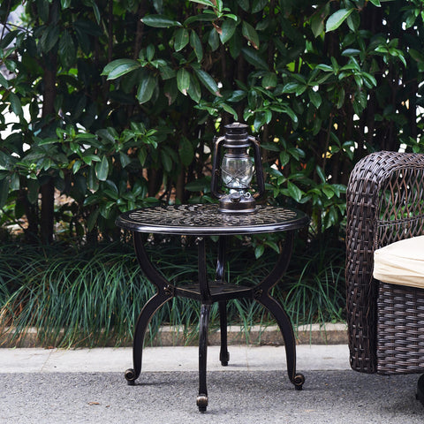 Mandolin round coffee table beside seating, weatherproof and easy to wipe clean.