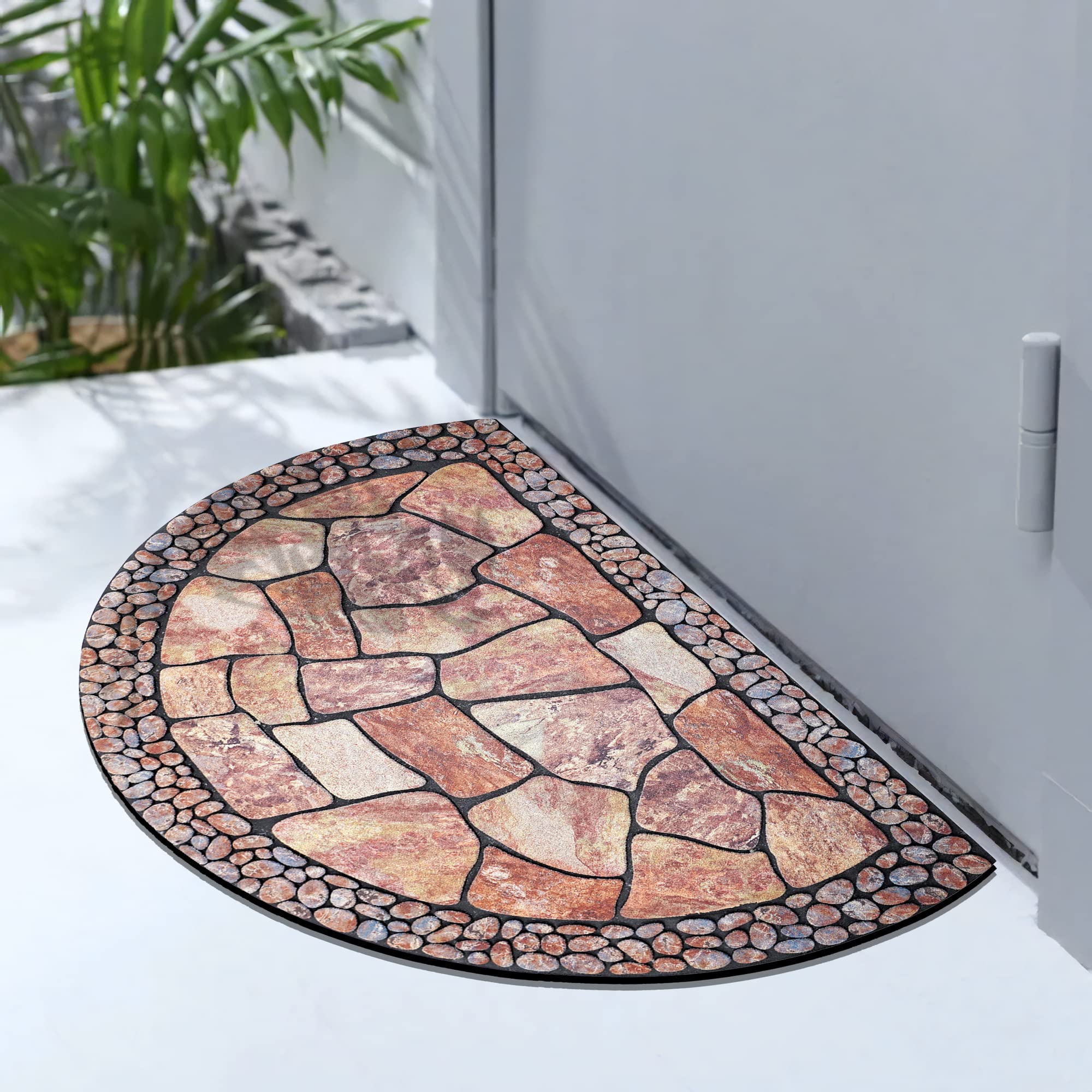 MANO wind-resistant mat stays put on breezy entryways and porches.