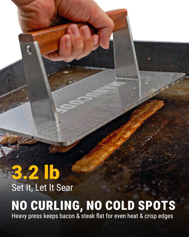 Manucode bacon press flat-bottom design ensures uniform contact on griddle