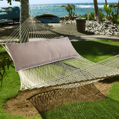 Maphissus hammock pillow used for reading in outdoor setting