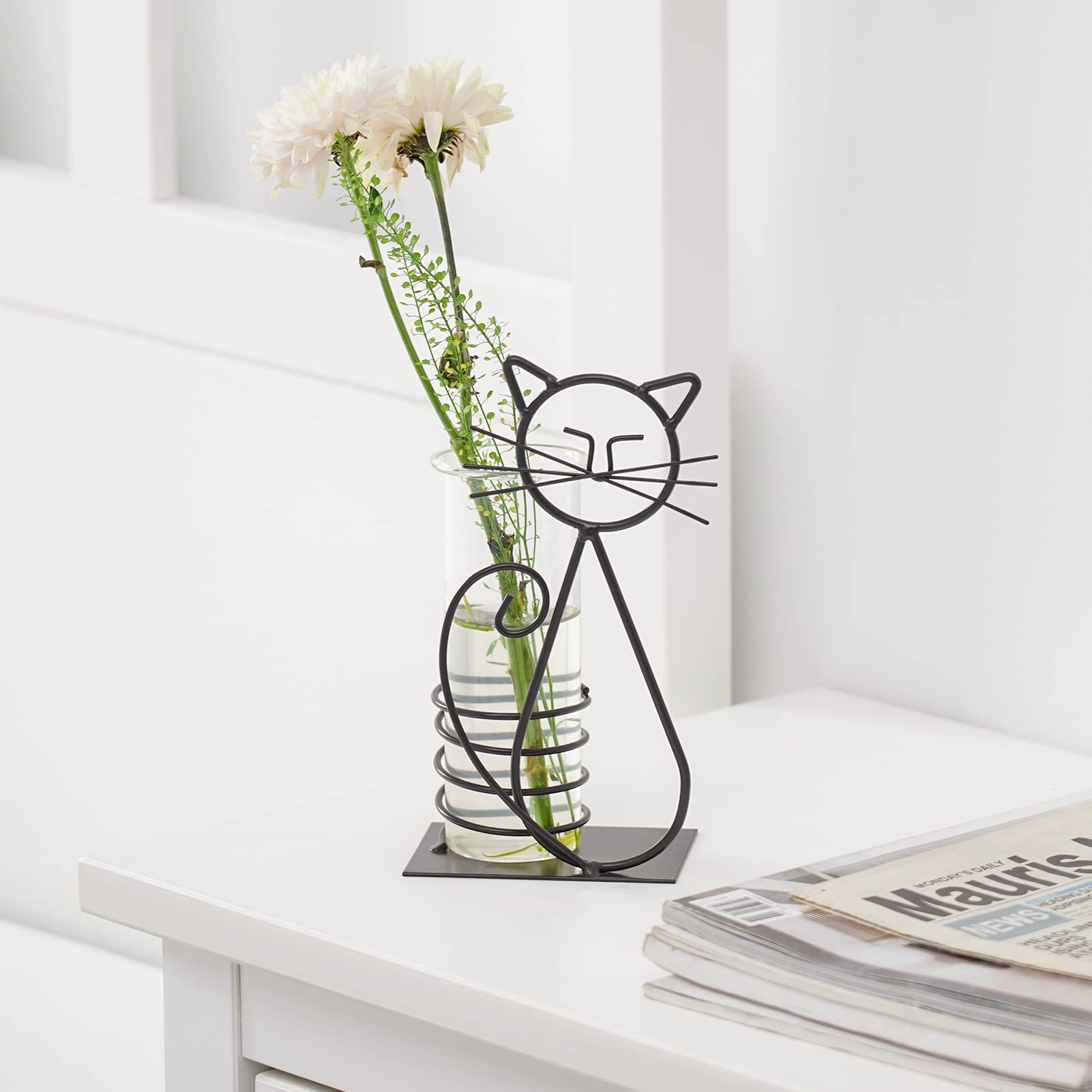 Durable iron holder keeps the glass container steady.