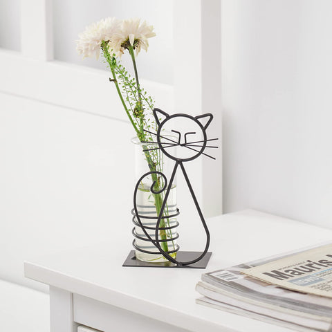 Durable iron holder keeps the glass container steady.