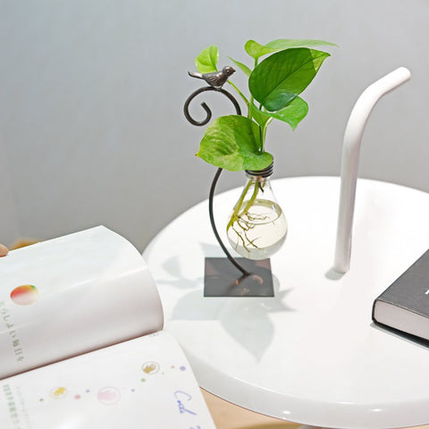 Marbrasse modern planter with glass bowl and iron stand on desk