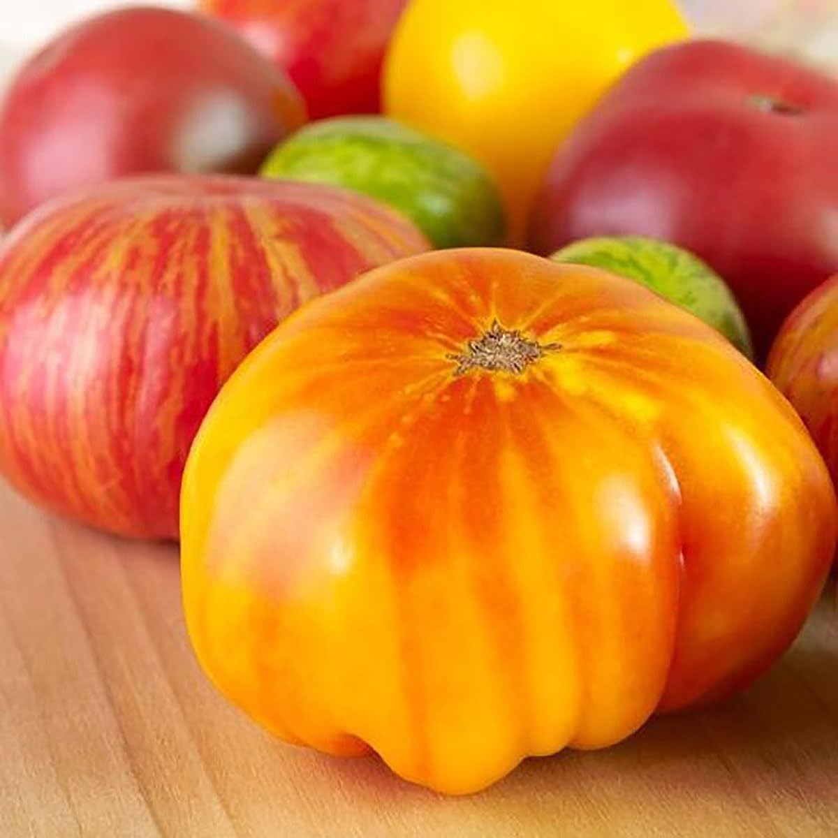 Marde Ross Rainbow Cherry Tomato Seeds produce ripe, juicy fruits for fresh salads.