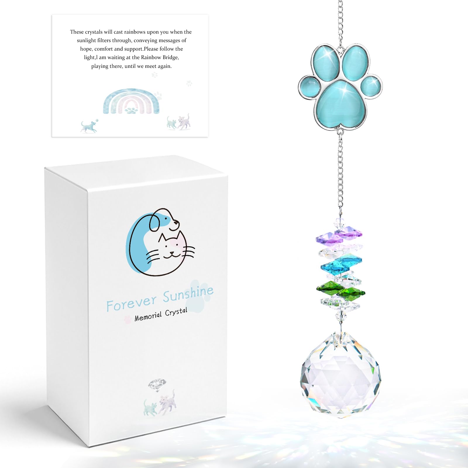 Mardili dog memorial sun catcher with blue paw print creates rainbow light in a sunny window.