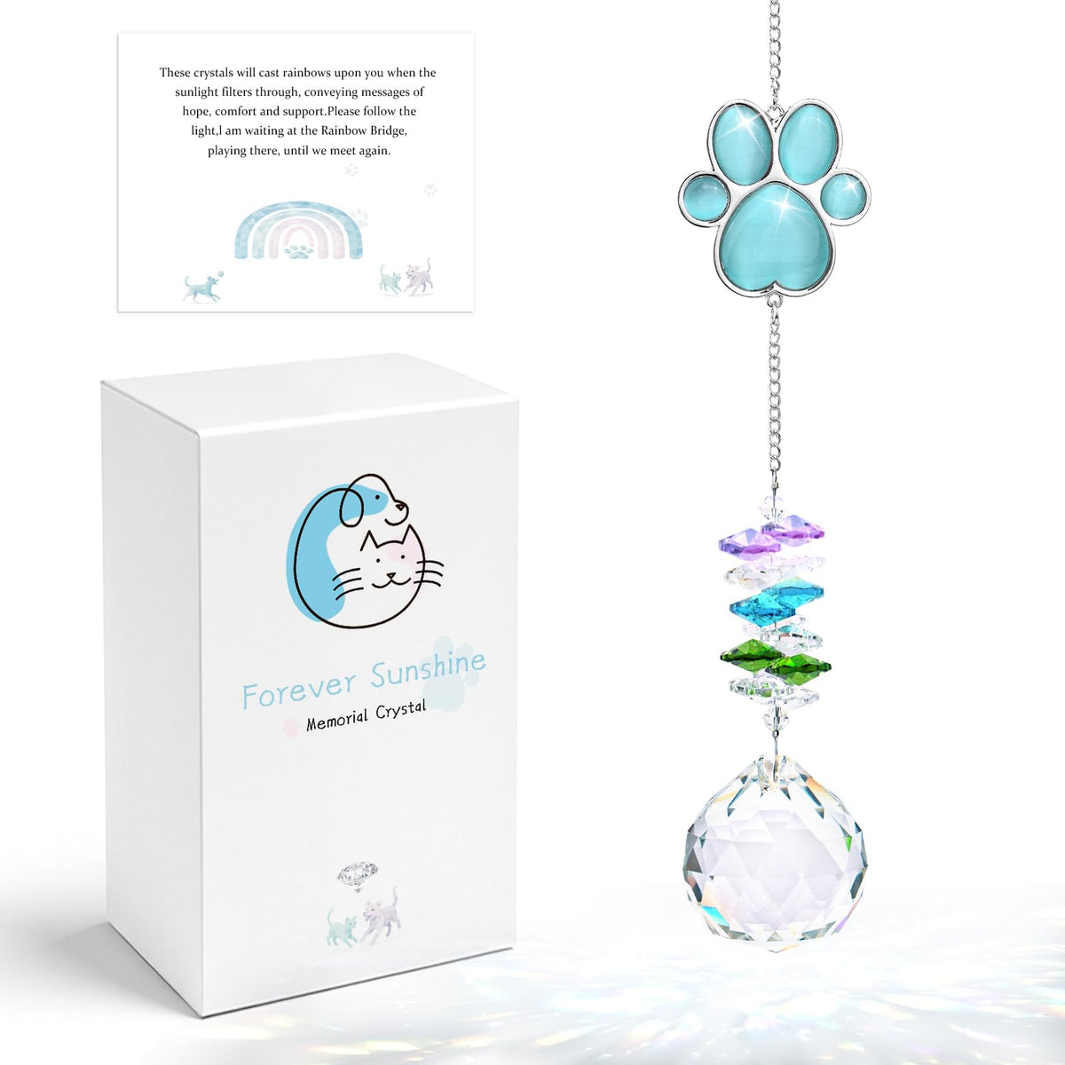 Mardili dog memorial sun catcher with blue paw print creates rainbow light in a sunny window.