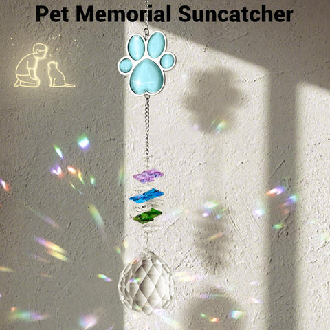 Mardili dog memorial sun catcher reflects rainbow light to brighten a workspace or window.