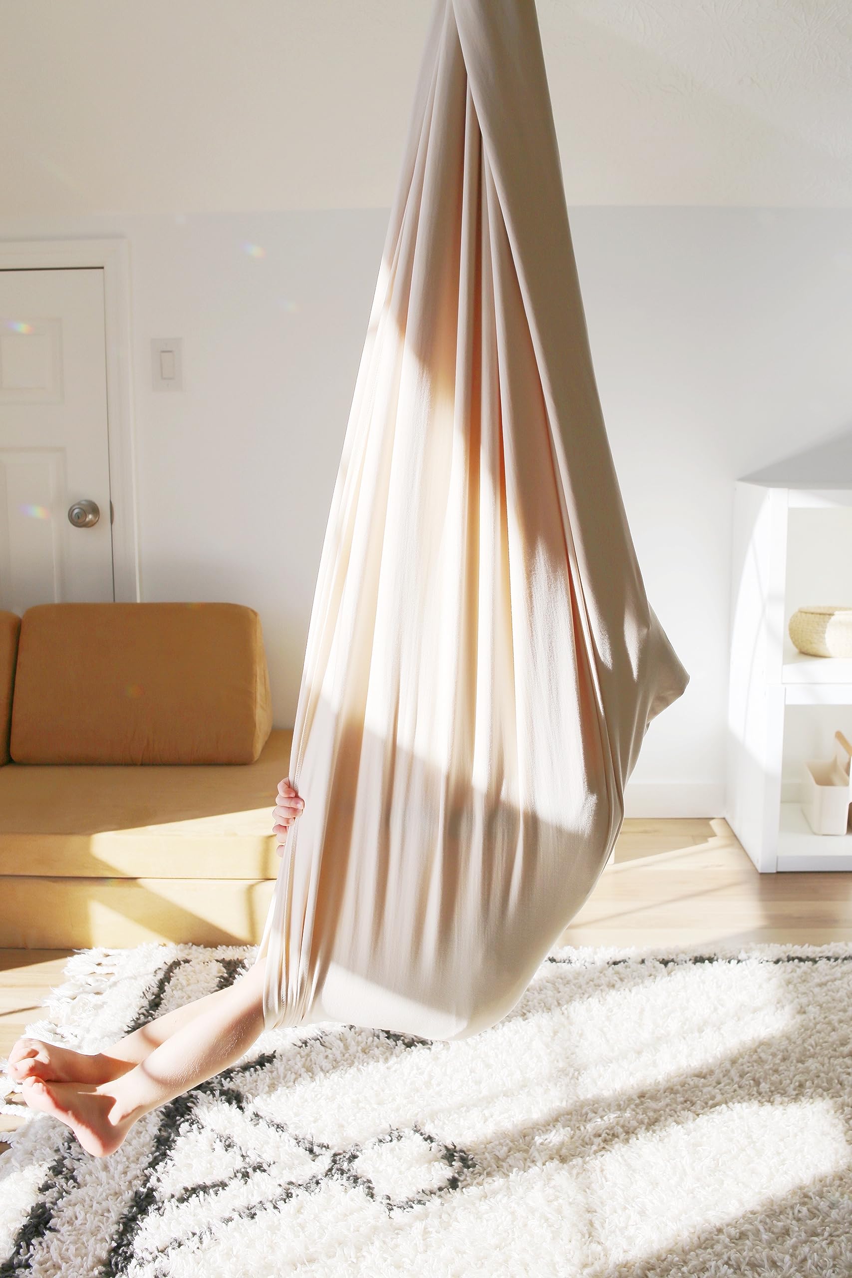 Marlowe & Co swing holds up to 200 pounds for growing kids.
