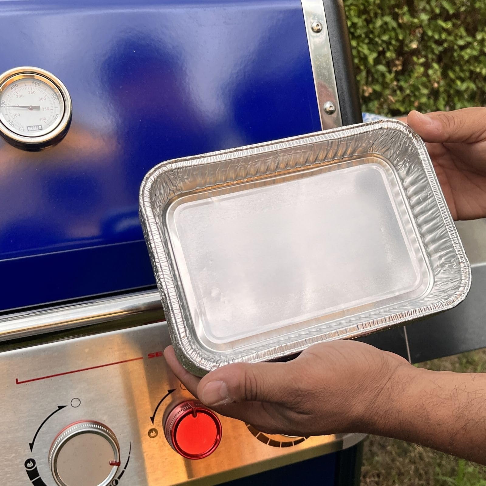 Matchwaves disposable foil trays show a leak-proof design for mess-free grilling.