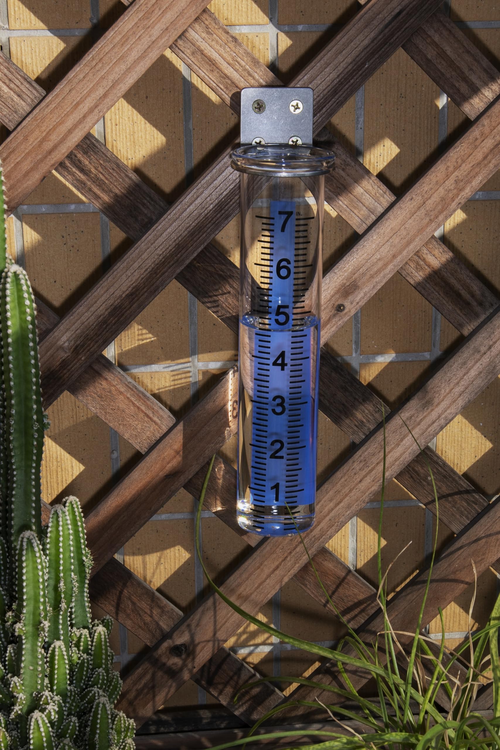 Mateda rain gauge mounted on a deck post for secure placement