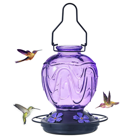 MCHBF Glass Hummingbird Feeder with red jar attracts hummingbirds outdoors