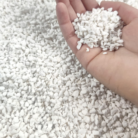 MDPQT Perlite 20qt bag closeup shows airy granules improving drainage.
