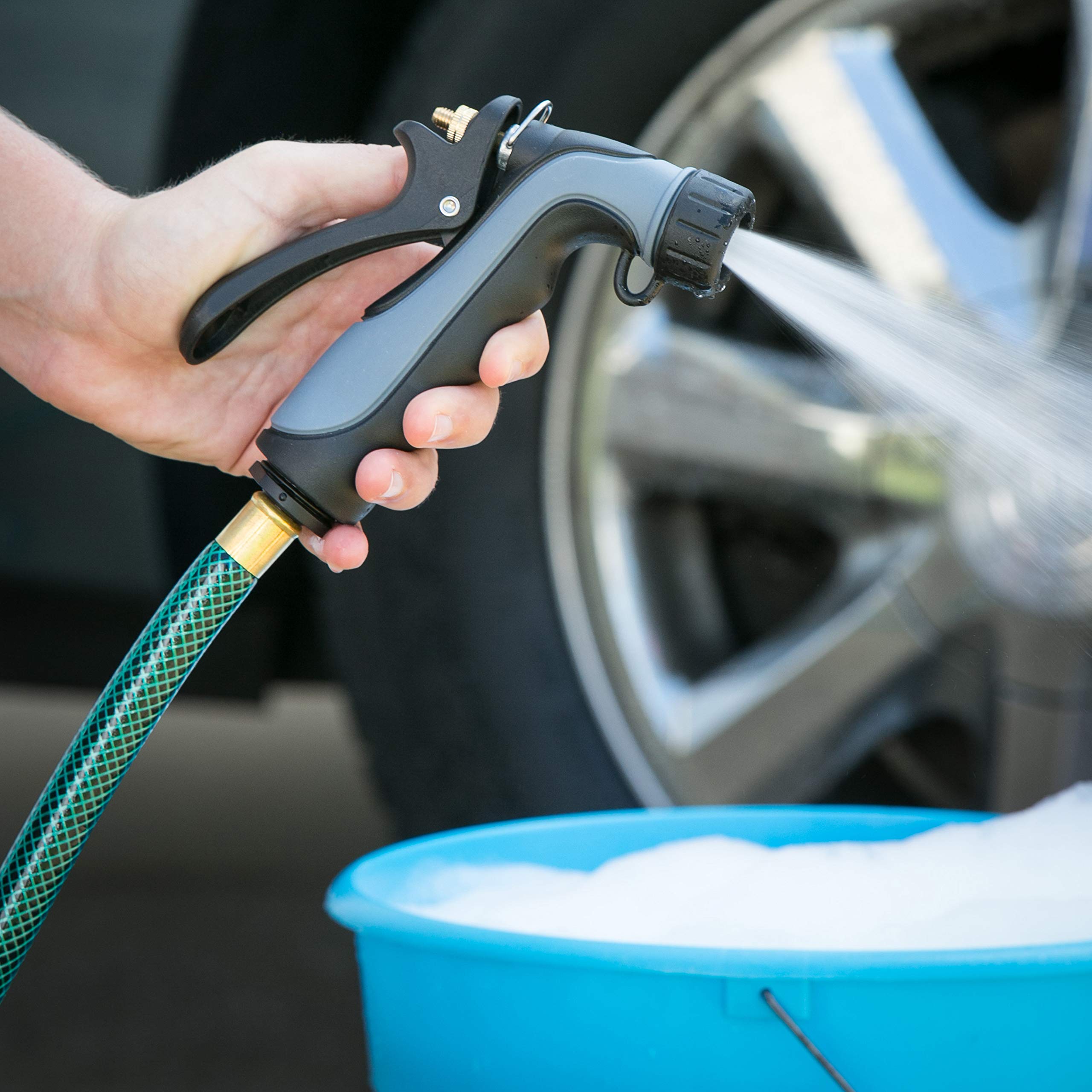 Melnor 465C industrial nozzle with thick insulation protecting hands during hot or cold use.