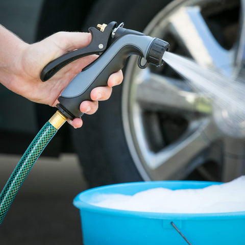 Melnor 465C industrial nozzle with thick insulation protecting hands during hot or cold use.