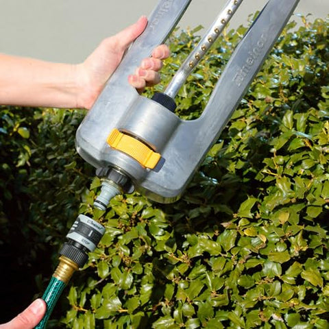 Locking connection shown to prevent accidental disconnections while watering
