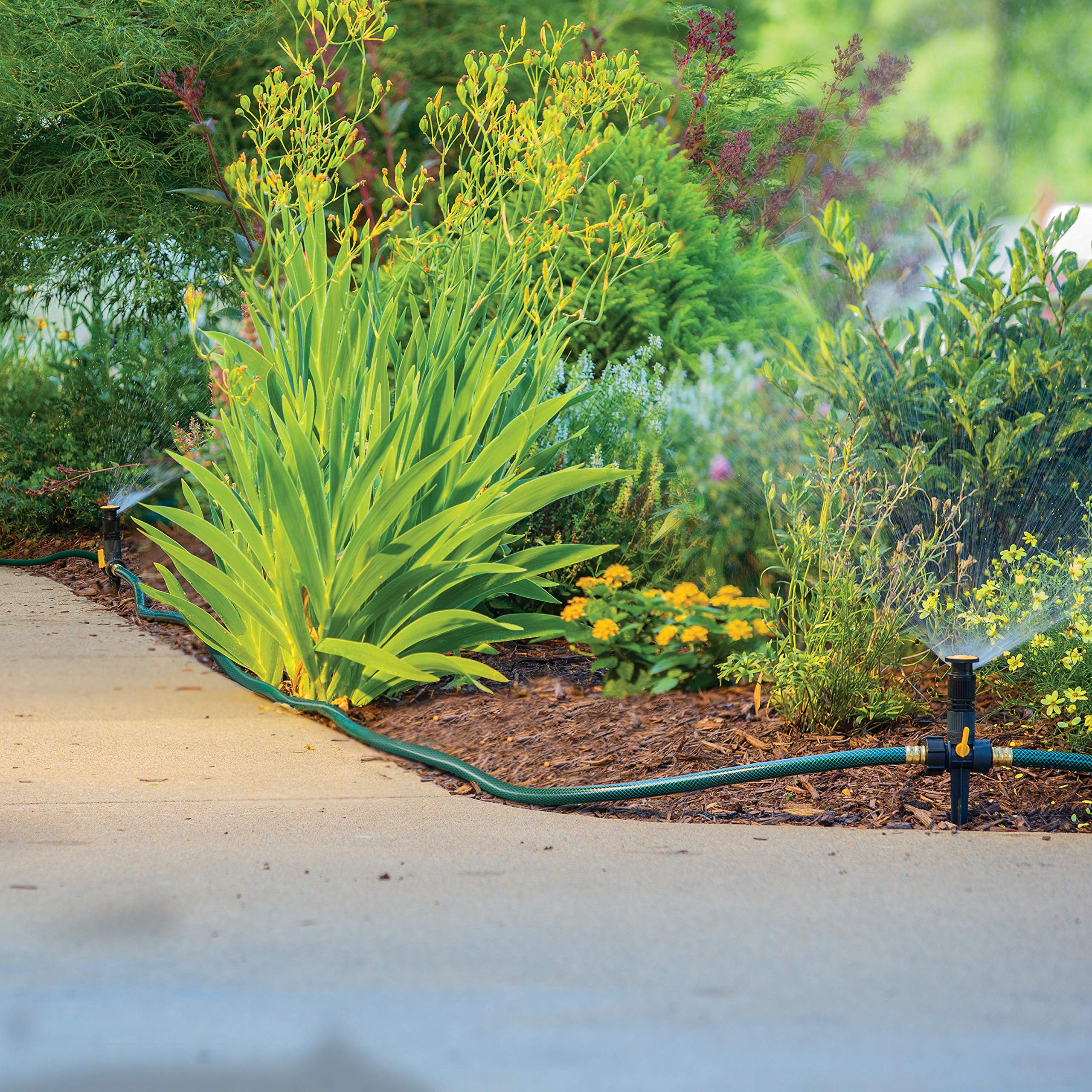 Melnor 65185AMZ flow-through base connects units without interrupting watering.