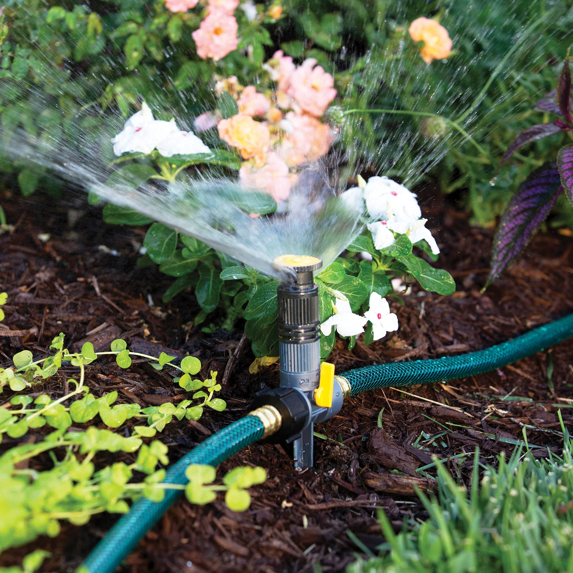 Melnor 65191AMZ coverage up to 1,800 sq ft with gentle watering for plants.
